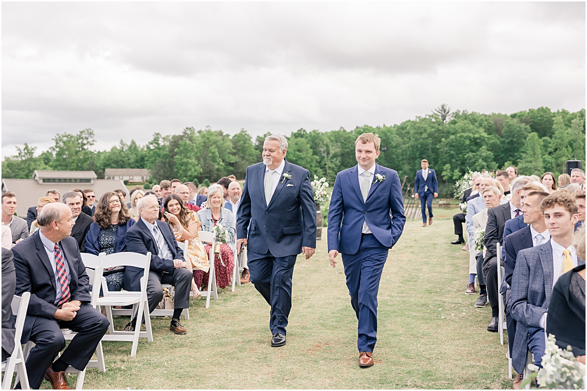 Davis walking down the aisle with his father at Cleveland GA Wedding Venues