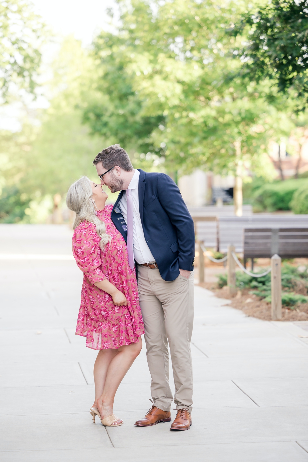 Austin and Sydney kissing during their engagement session.