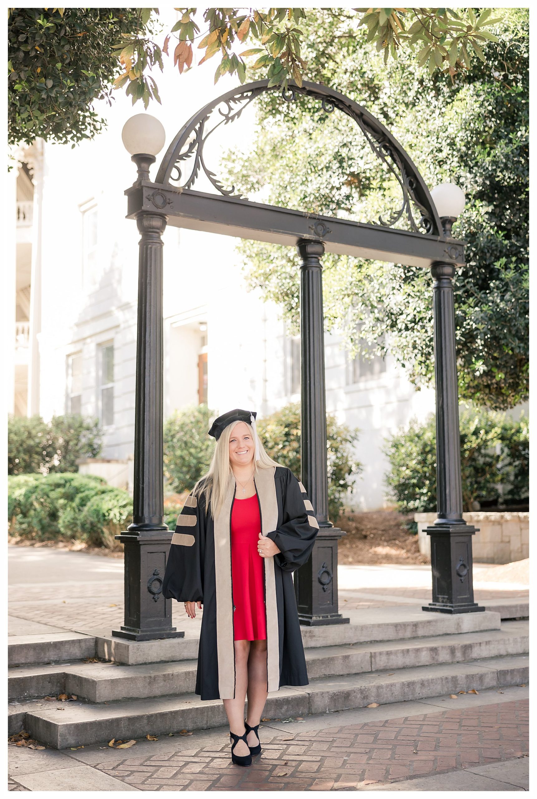 uga graduation photos at the arches in cap and gown by the best Athens senior photographer
