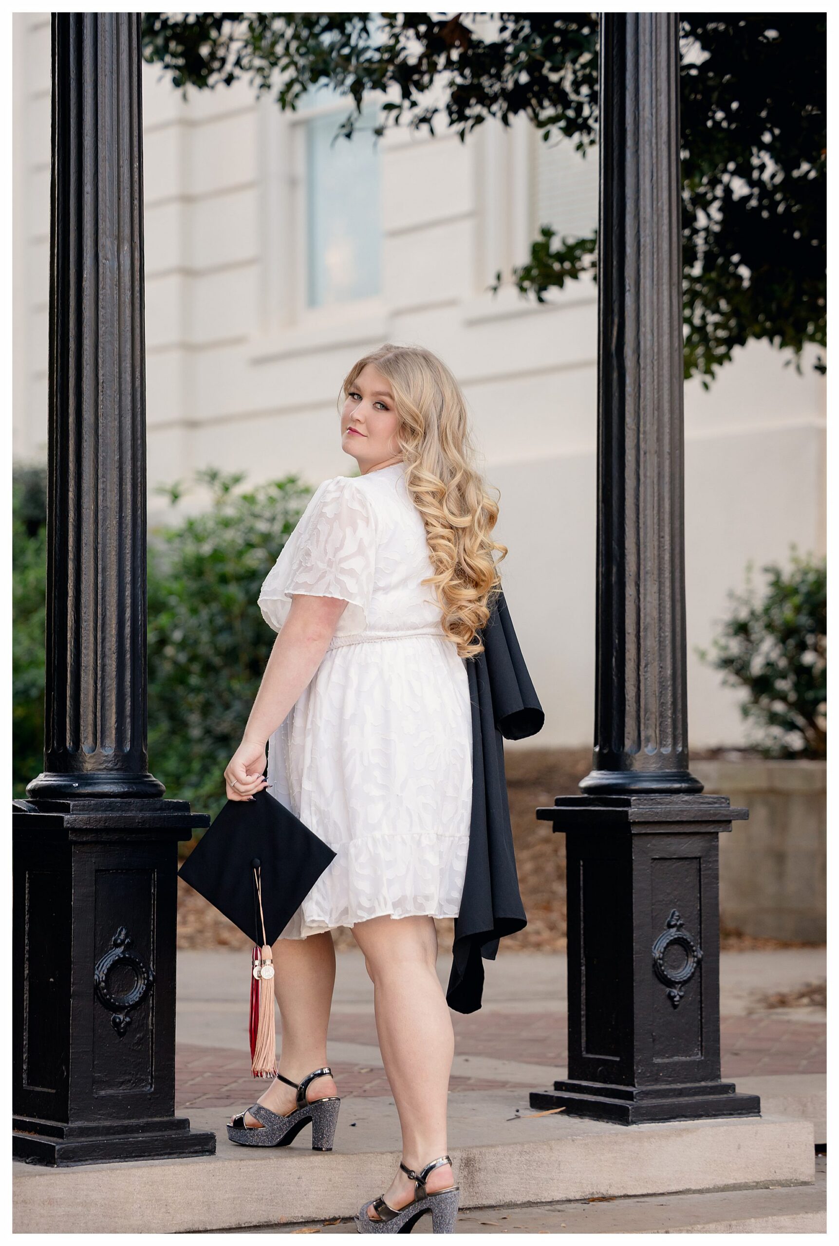 Beautiful curvy UGA Graduate. Plus Size senior photographer in Athens.
