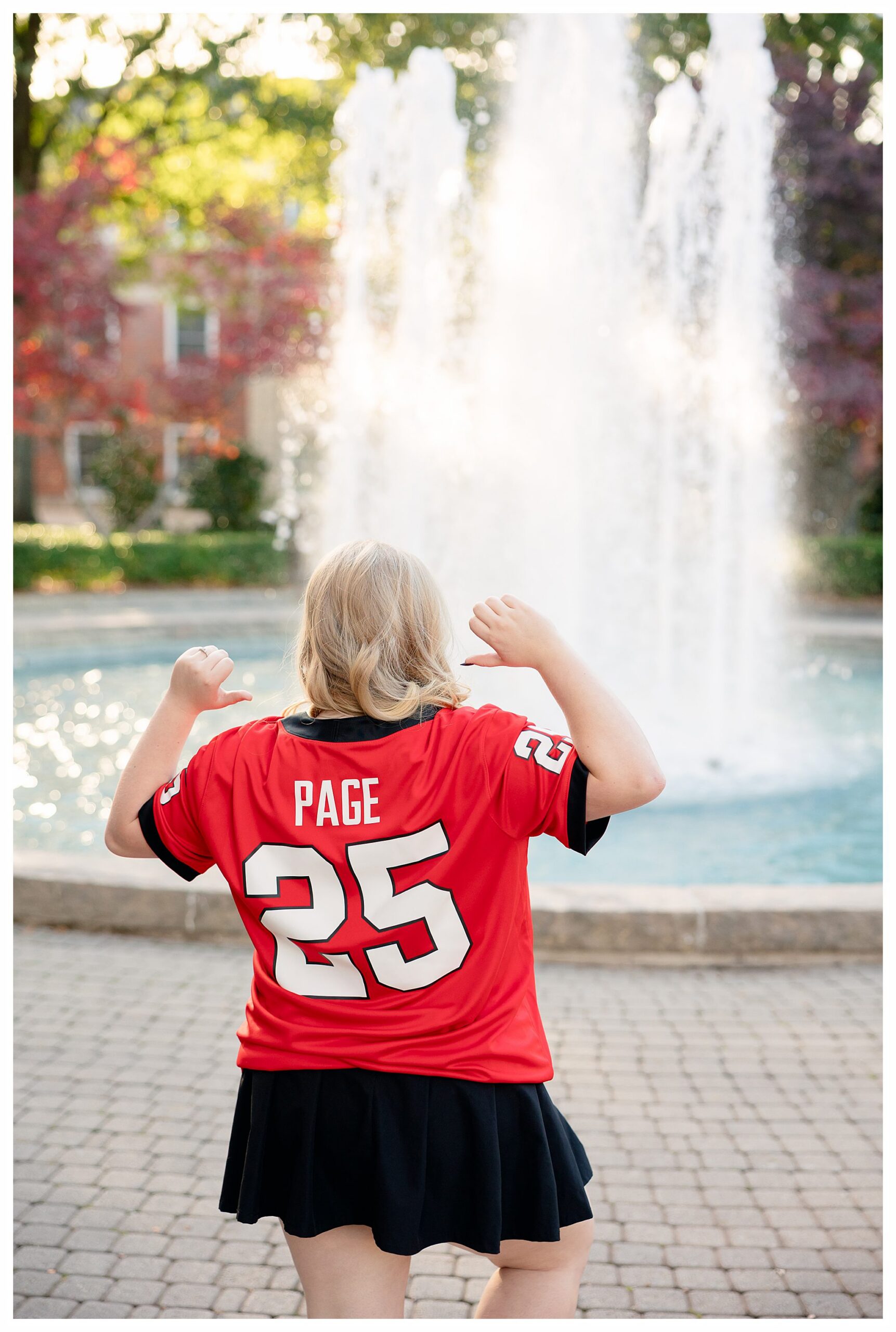 UGA Grad Photos at Herty Field Fountain with a plus size grad 